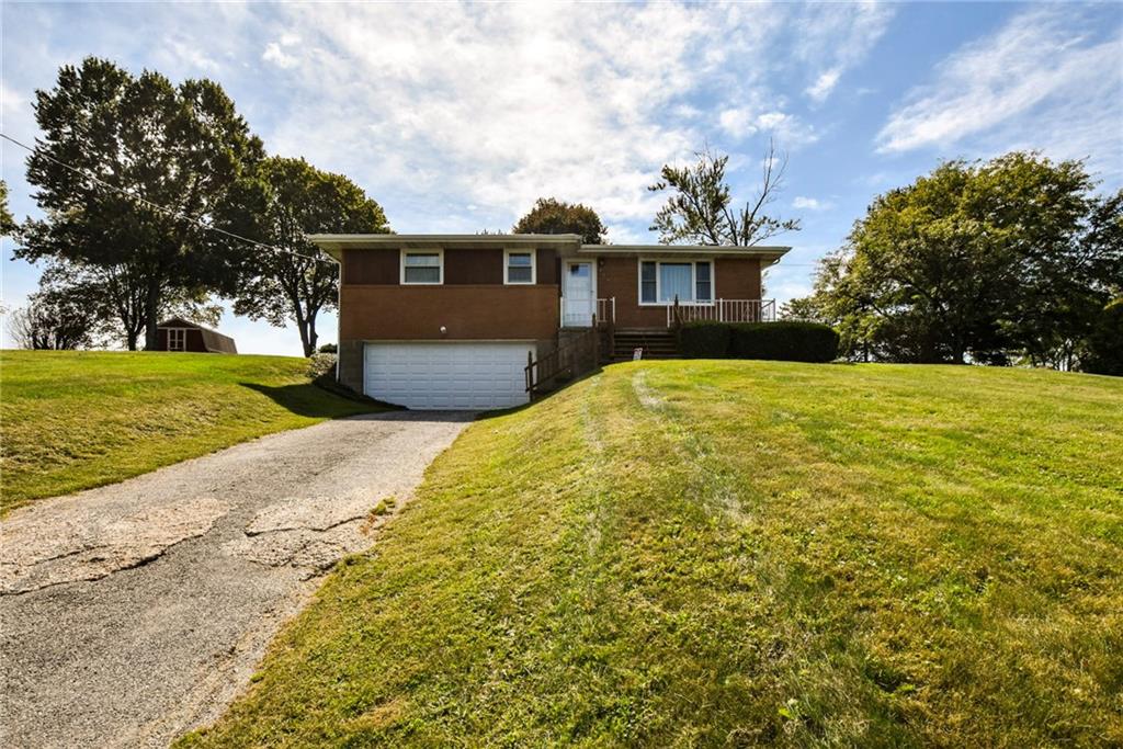 428 Dinnerbell Road Butler, PA 16002 - Photo 1 of 14 a view of a house with a yard