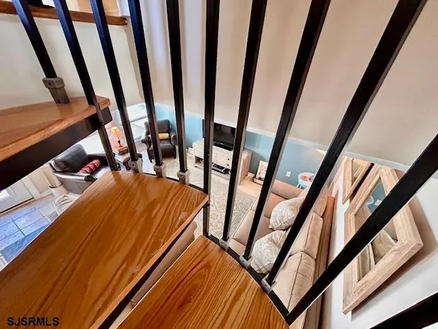 a bed room with furniture and a window