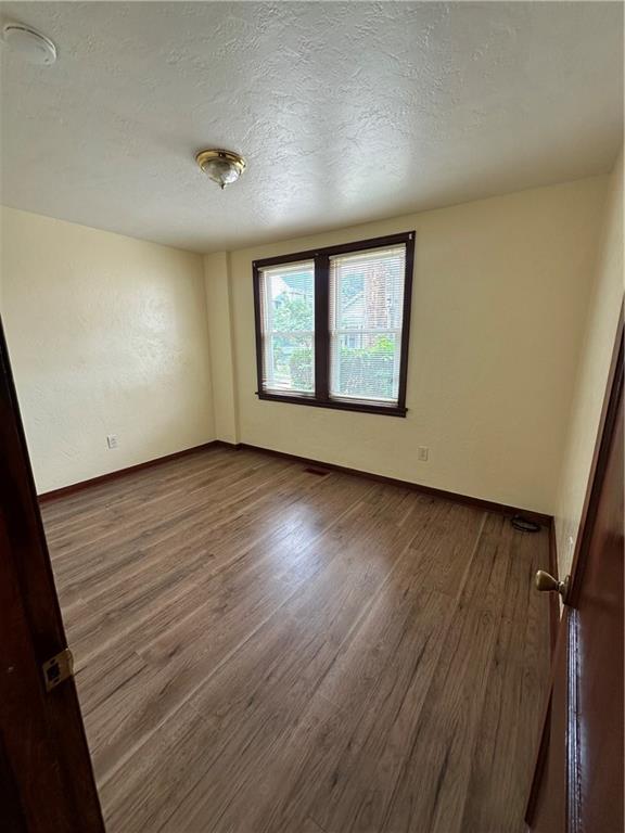 Unit 1 front bedroom.