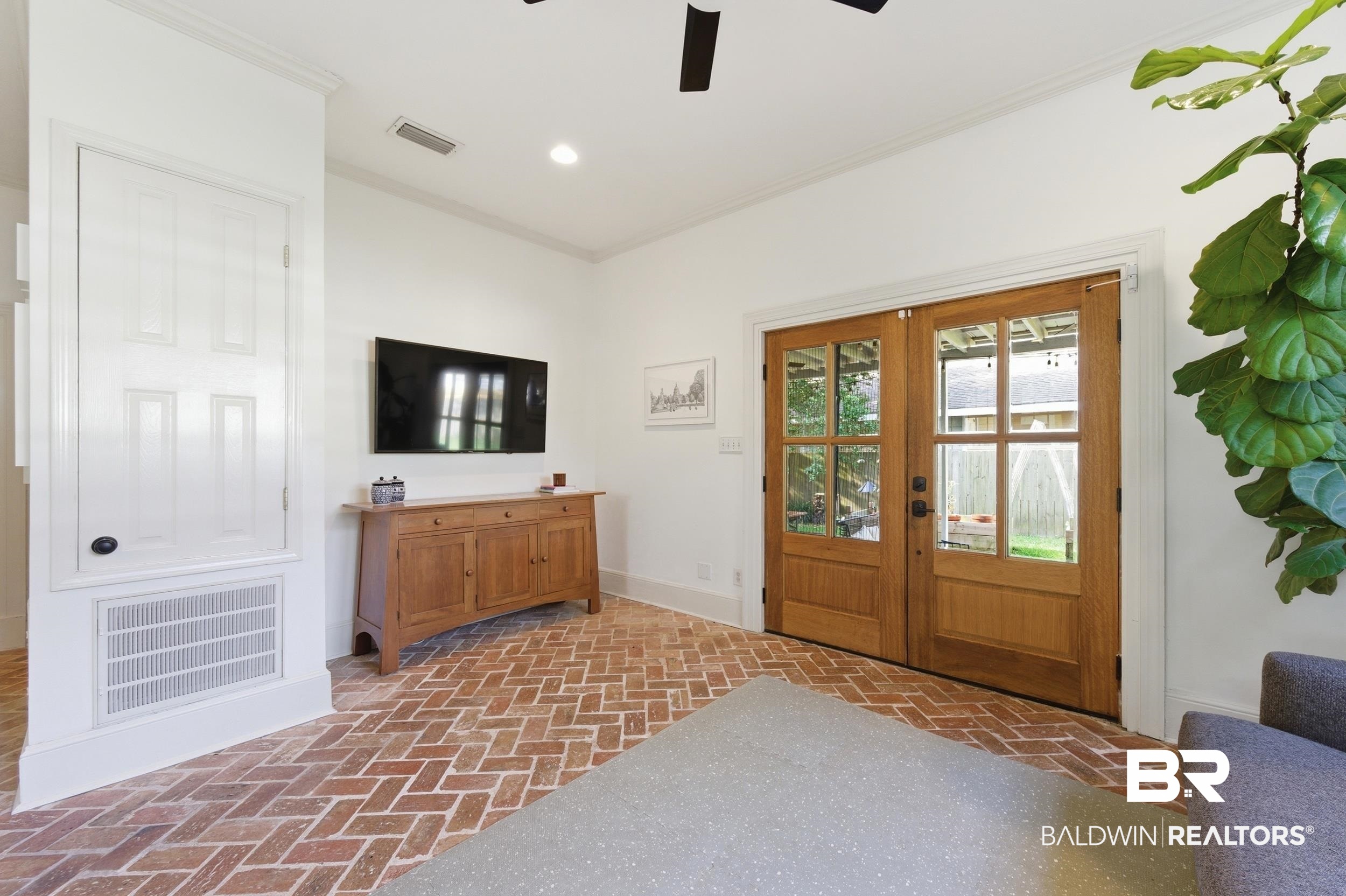 350 Charles Street Mobile, AL 36604 - Photo 13 of 52 Interior space featuring brick flooring in a herringbone pattern