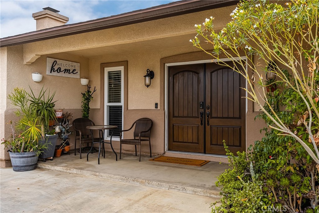 7233 Bel Air Street Corona, CA 92881 - Photo 15 of 39 a front view of house with yard