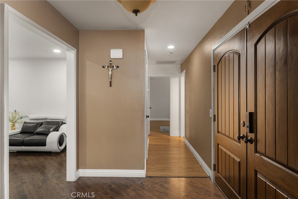 7233 Bel Air Street Corona, CA 92881 - Photo 35 of 39 a view of a livingroom with furniture and stairs