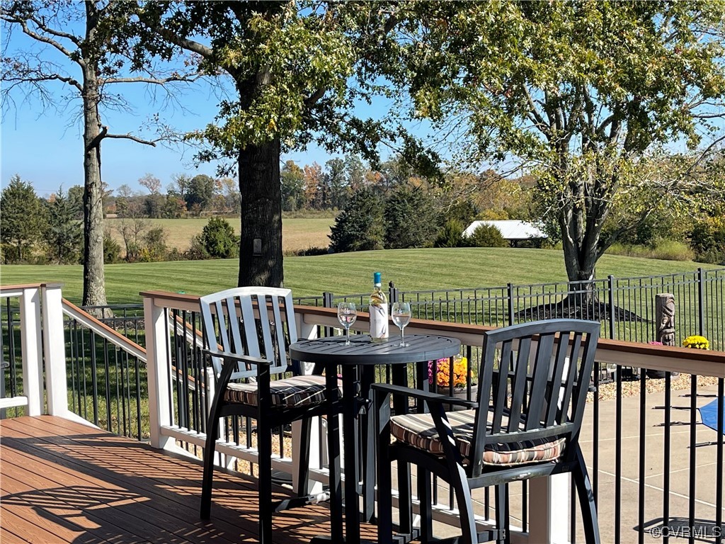 11221 Bristersburg Road Catlett, VA 20119 - Photo 12 of 49 a view of a deck with furniture and a yard