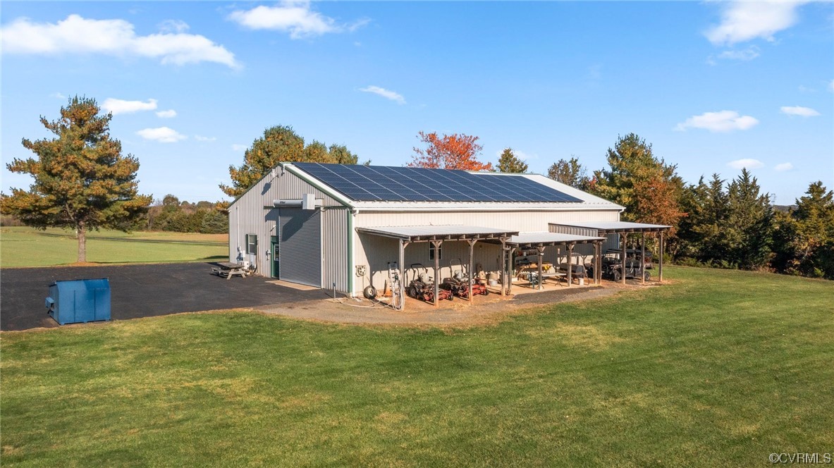 11221 Bristersburg Road Catlett, VA 20119 - Photo 13 of 49 a view of a house with patio and garden