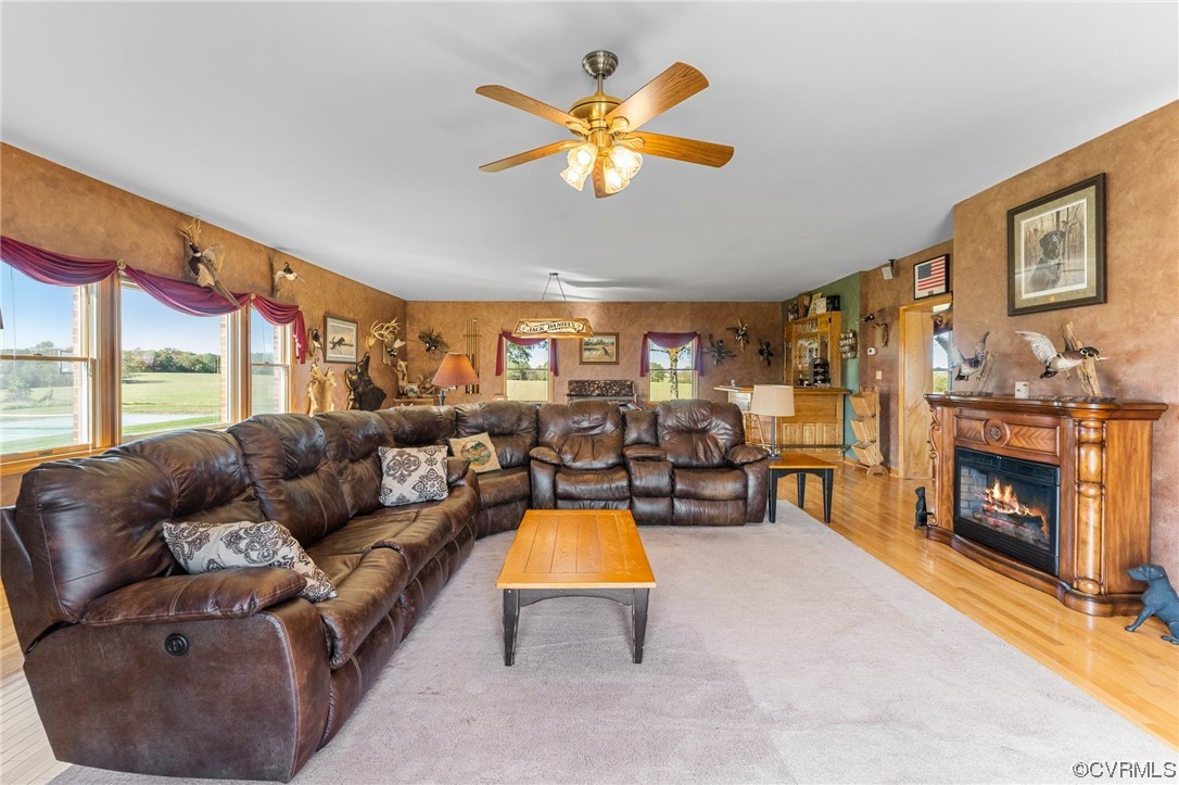 11221 Bristersburg Road Catlett, VA 20119 - Photo 22 of 49 a living room with furniture fireplace and flat screen tv