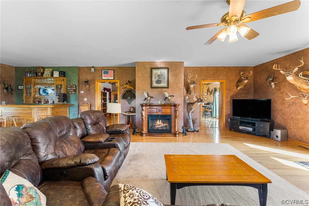 11221 Bristersburg Road Catlett, VA 20119 - Photo 23 of 49 a living room with furniture and a flat screen tv