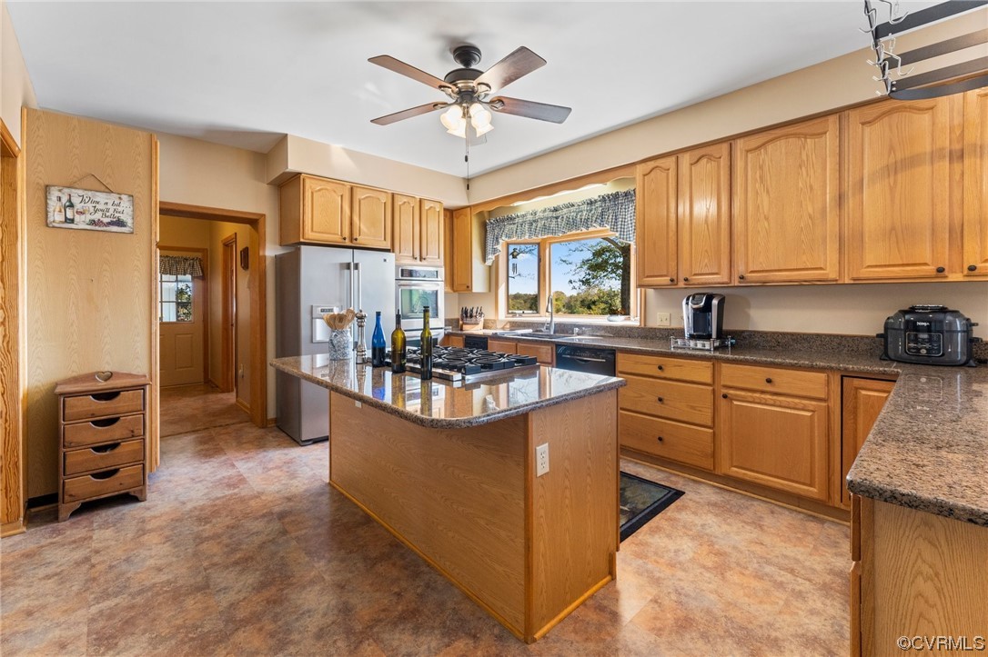 11221 Bristersburg Road Catlett, VA 20119 - Photo 26 of 49 a kitchen with stainless steel appliances granite countertop a stove a sink a refrigerator and cabinets