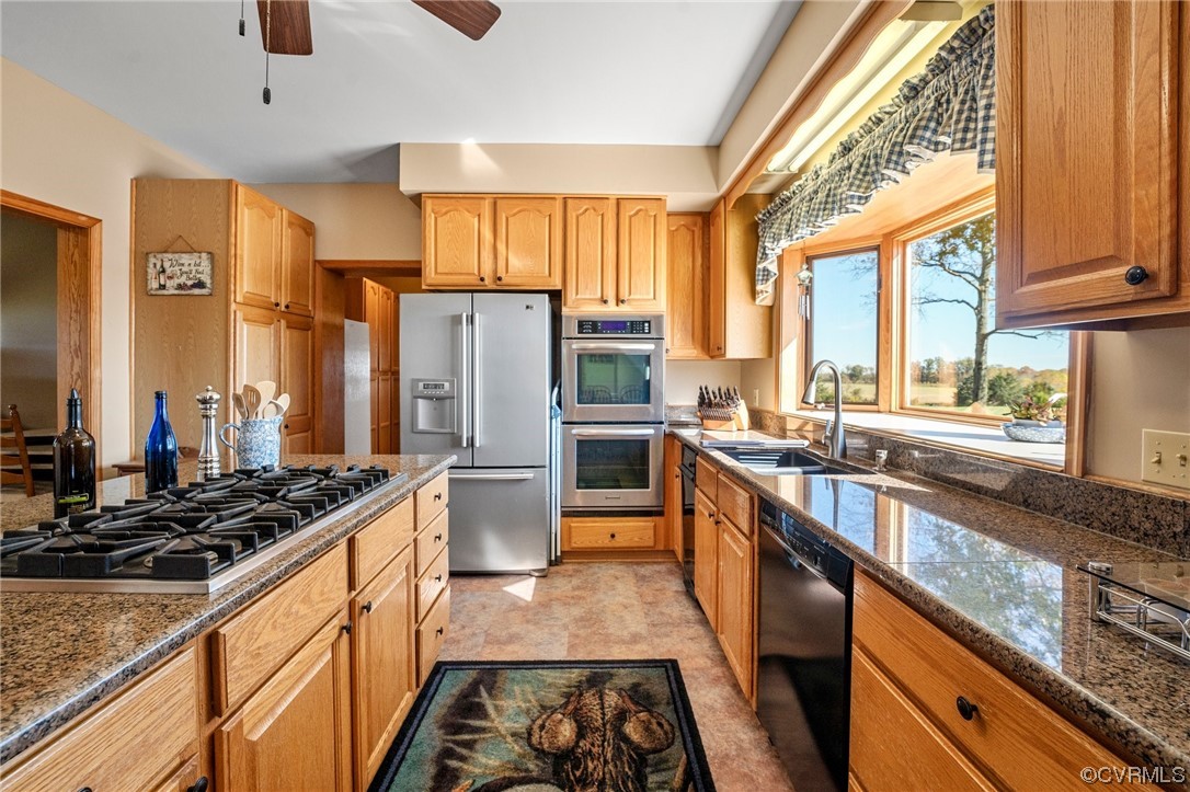 11221 Bristersburg Road Catlett, VA 20119 - Photo 28 of 49 a kitchen with stainless steel appliances a stove sink and refrigerator