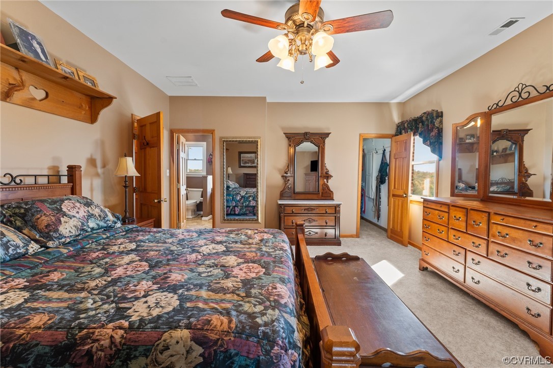 11221 Bristersburg Road Catlett, VA 20119 - Photo 30 of 49 a bedroom with a bed and wooden floor
