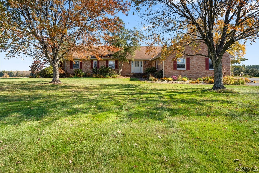 11221 Bristersburg Road Catlett, VA 20119 - Photo 32 of 49 a brick house with trees in front of it
