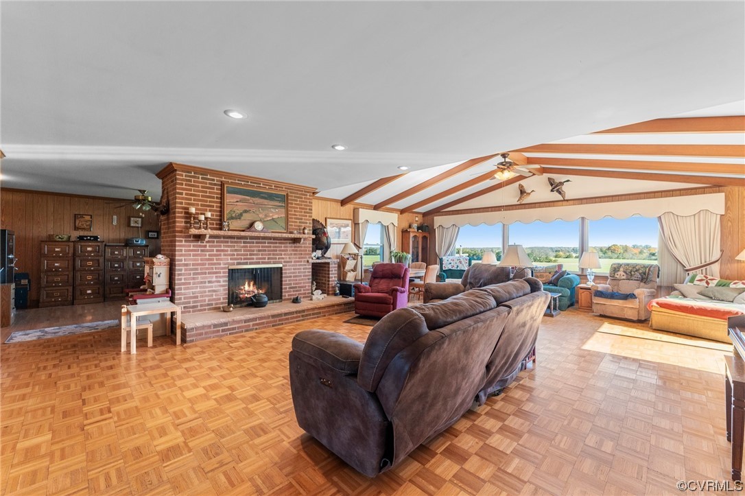 11221 Bristersburg Road Catlett, VA 20119 - Photo 34 of 49 a living room with furniture a fireplace and a floor to ceiling window