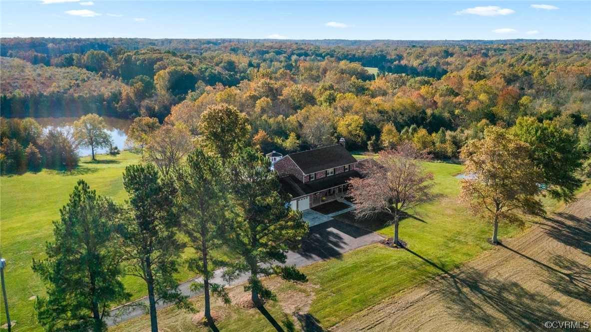 11221 Bristersburg Road Catlett, VA 20119 - Photo 5 of 49 a view of a lake with a mountain in the background