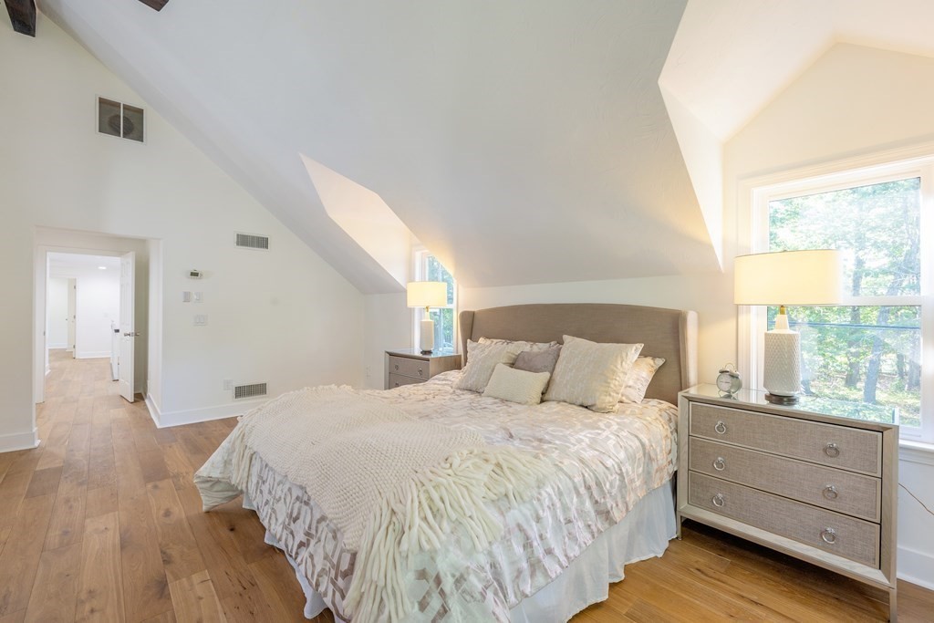 66 Patten Road Westford, MA 01886 - Photo 20 of 42 a bedroom with a bed and a large window