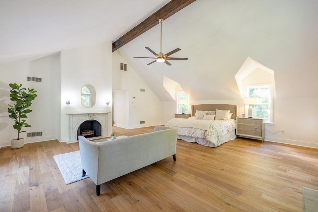 66 Patten Road Westford, MA 01886 - Photo 21 of 42 a living room with furniture and a fireplace