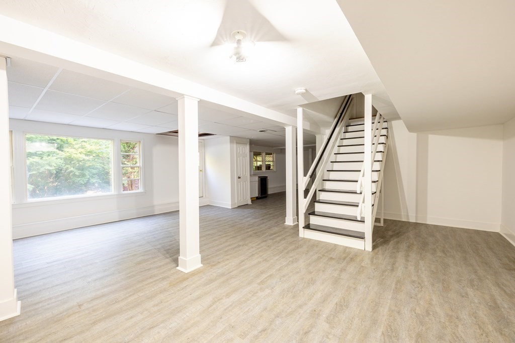 66 Patten Road Westford, MA 01886 - Photo 31 of 42 wooden floor in an empty room with a window