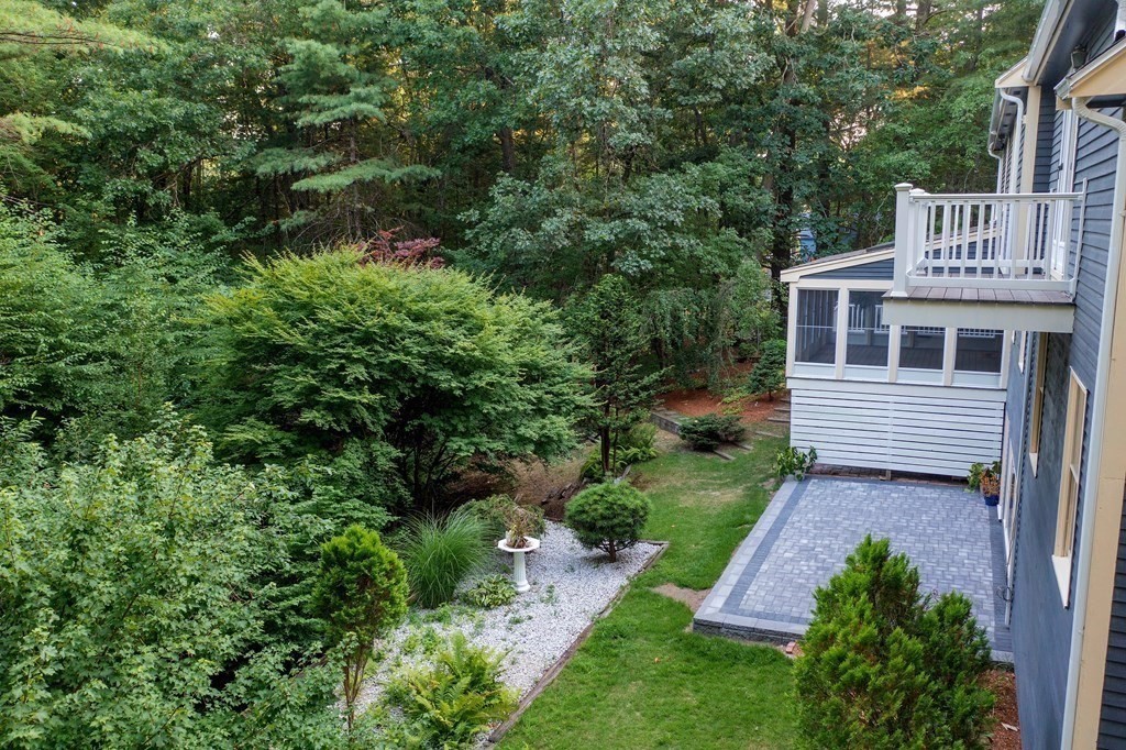 66 Patten Road Westford, MA 01886 - Photo 39 of 42 a view of a house with a yard