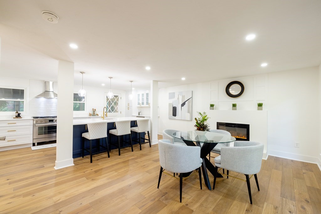 66 Patten Road Westford, MA 01886 - Photo 4 of 42 a view of a dining room with furniture and wooden floor