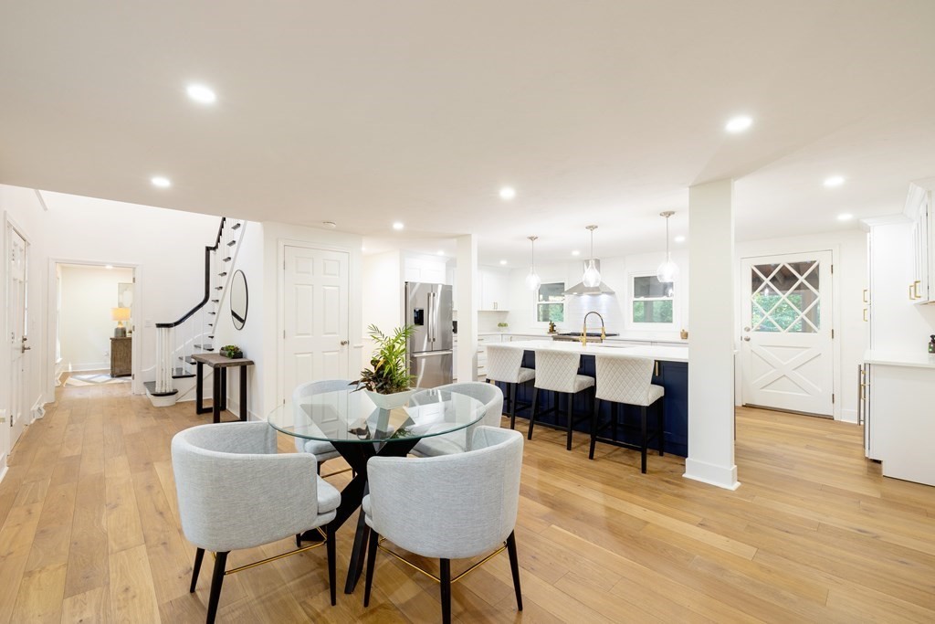66 Patten Road Westford, MA 01886 - Photo 5 of 42 a dining room with furniture and wooden floor
