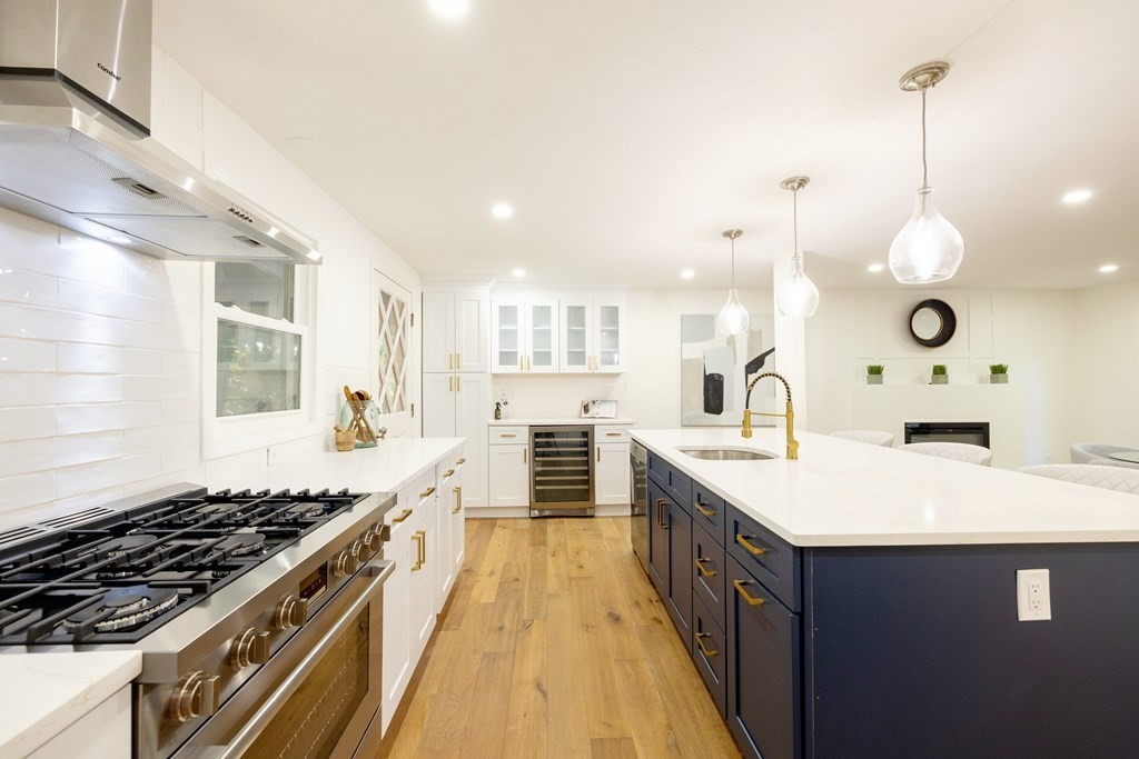 66 Patten Road Westford, MA 01886 - Photo 8 of 42 a large kitchen with a stove and a sink