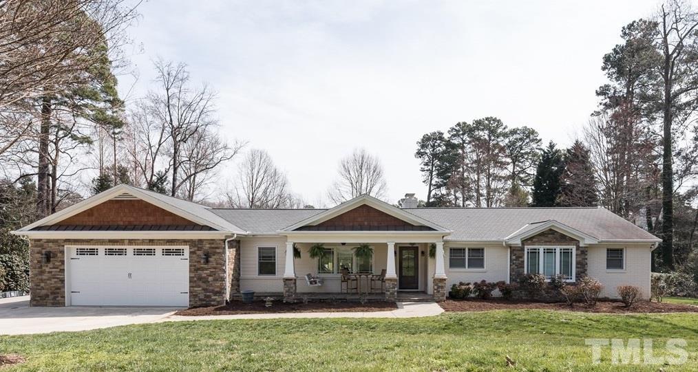 1910 Highland Place Raleigh, NC 27607 - Photo 1 of 25 front view of a house with a yard