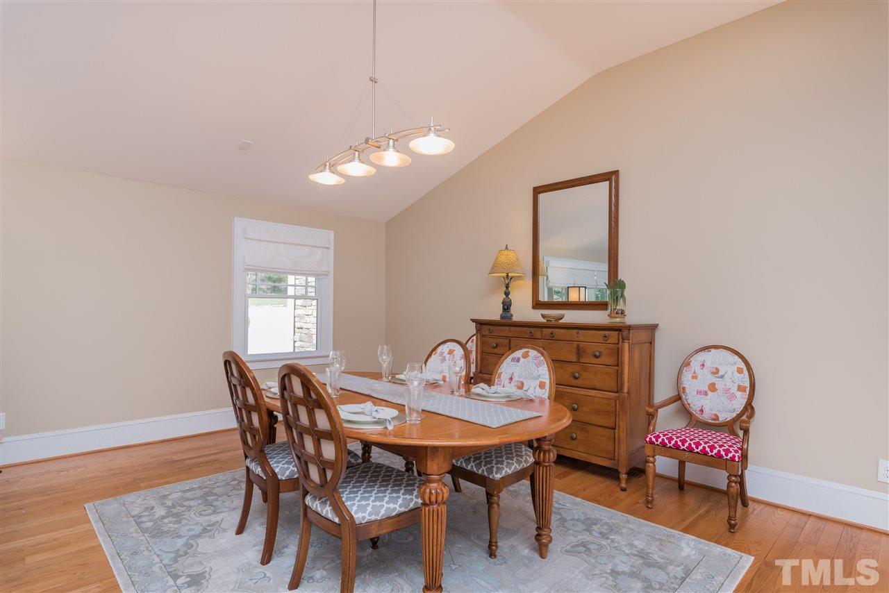 1910 Highland Place Raleigh, NC 27607 - Photo 12 of 25 a view of a dining room with furniture and wooden floor