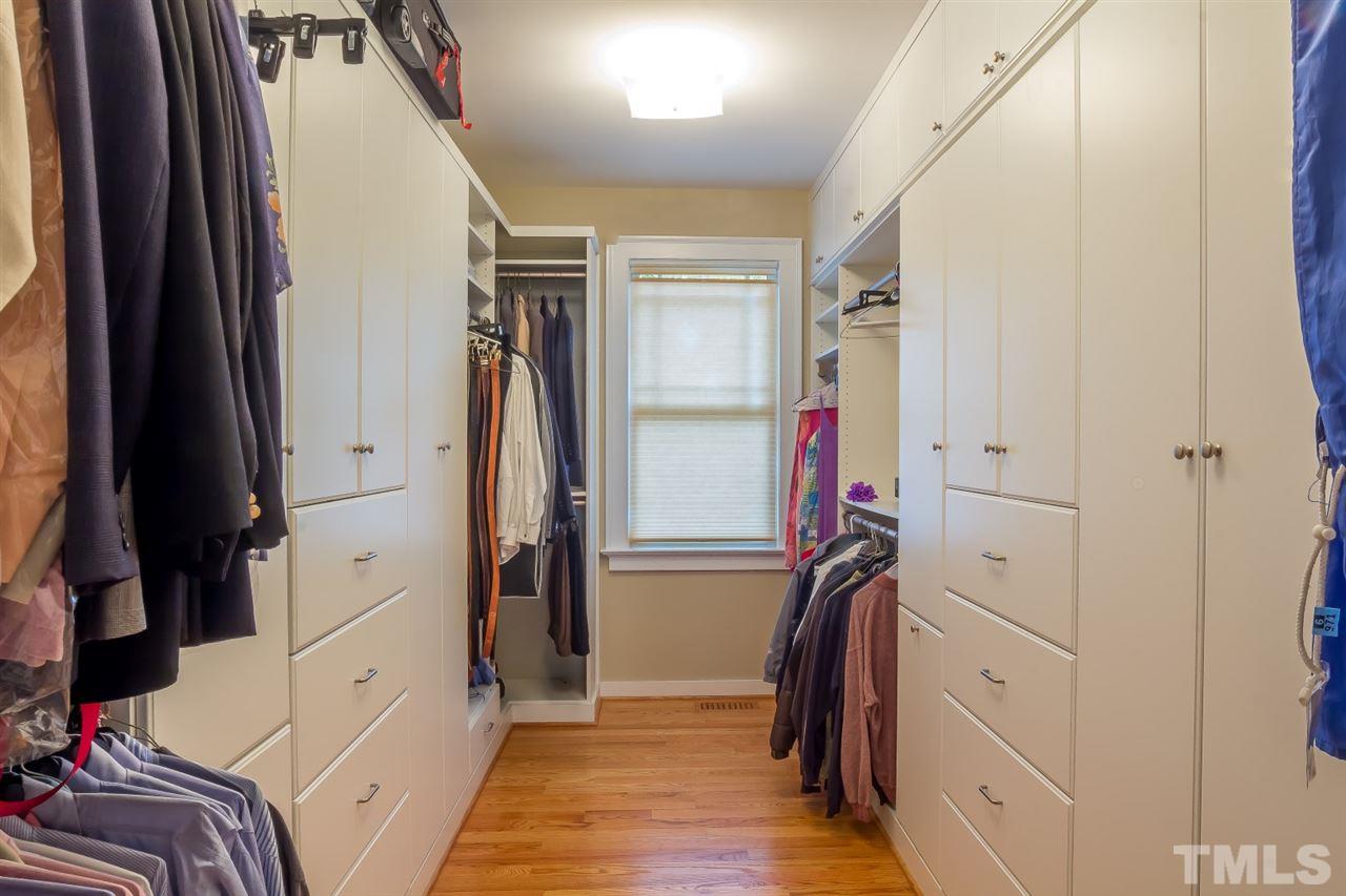 1910 Highland Place Raleigh, NC 27607 - Photo 16 of 25 a view of walk in closet with clothes and shoes