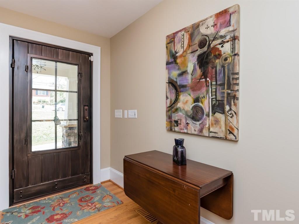 1910 Highland Place Raleigh, NC 27607 - Photo 3 of 25 a bedroom with a bed and a window