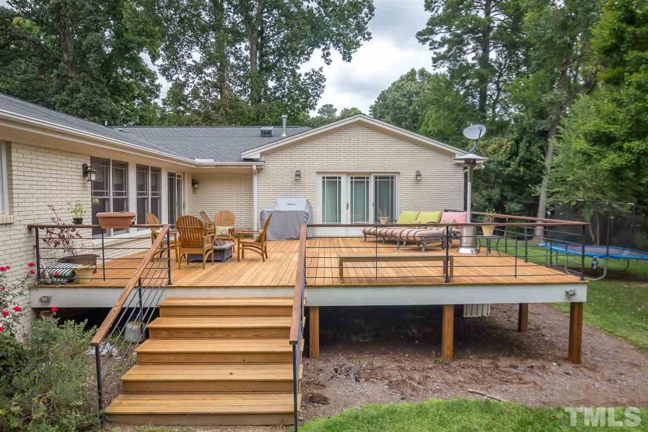 1910 Highland Place Raleigh, NC 27607 - Photo 21 of 25 a view of a house with backyard and sitting area