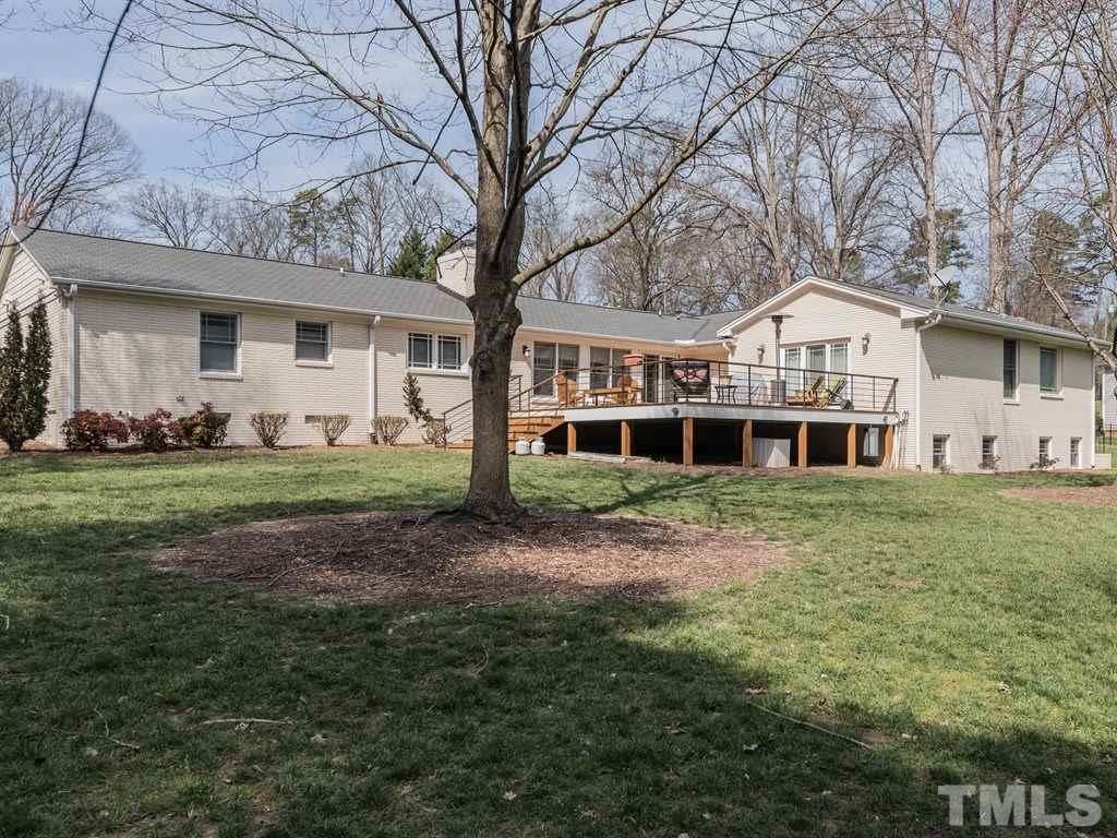 1910 Highland Place Raleigh, NC 27607 - Photo 23 of 25 a front view of a house with a yard