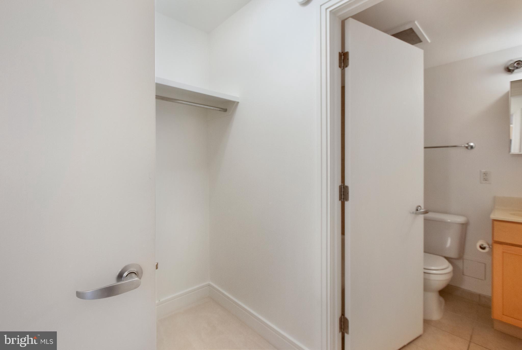 800 4th Street Southwest, Unit S403 Washington, DC 20024 - Photo 16 of 25 Bath with walk in closet