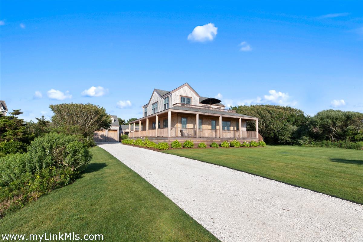 3 Tautemo Way Nantucket, MA 02554 - Photo 5 of 57 a front view of a house with a yard