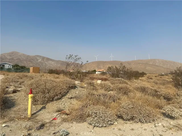 a view of an outdoor space with mountain view