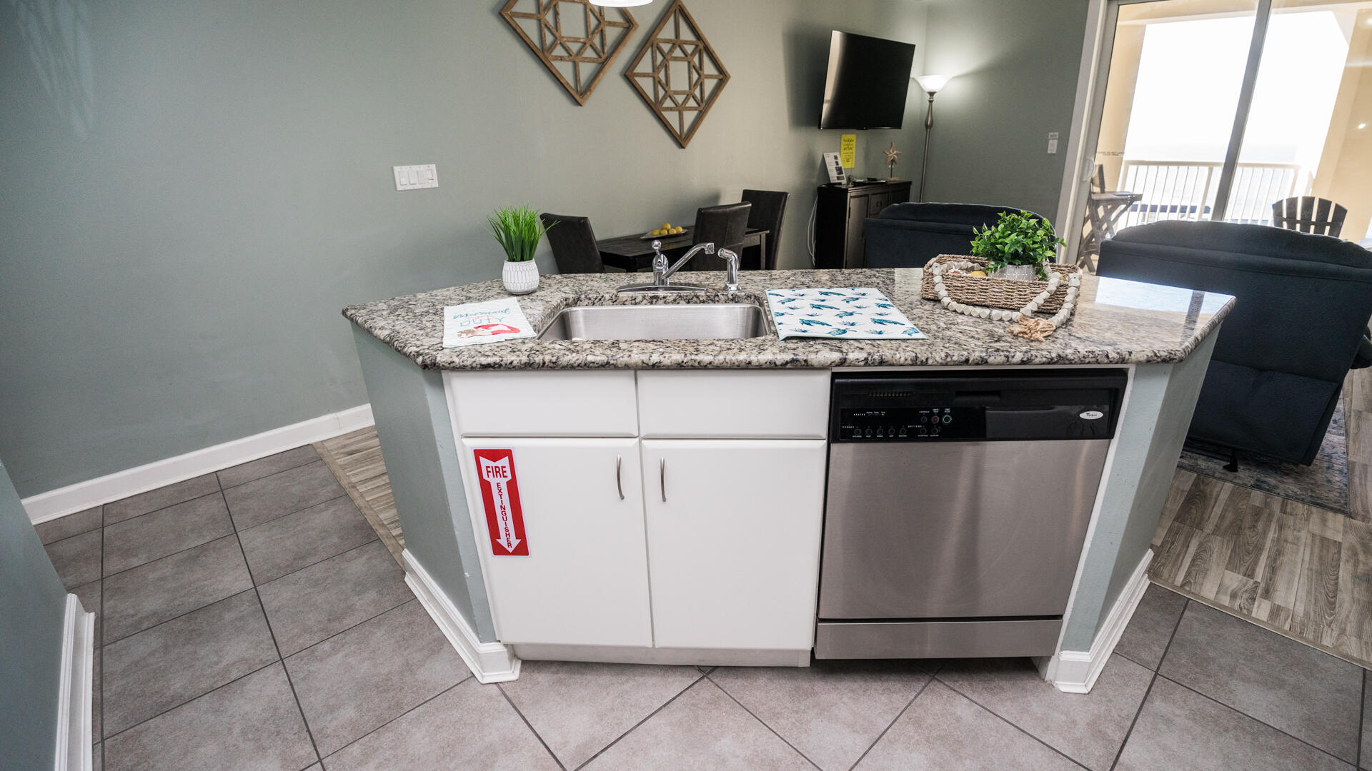11800 Front Beach Road, Unit 703 Panama City Beach, FL 32407 - Photo 31 of 52 a bathroom with a granite countertop sink and a mirror