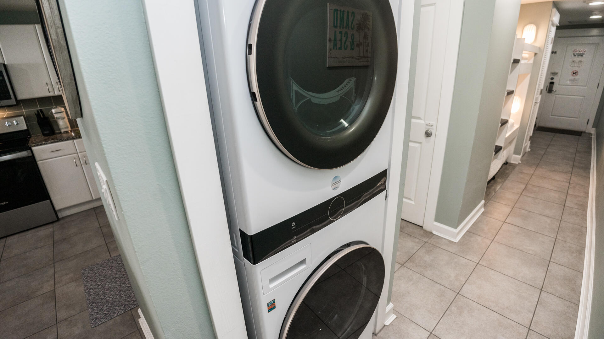 11800 Front Beach Road, Unit 703 Panama City Beach, FL 32407 - Photo 35 of 52 a close up view of a washer and dryer