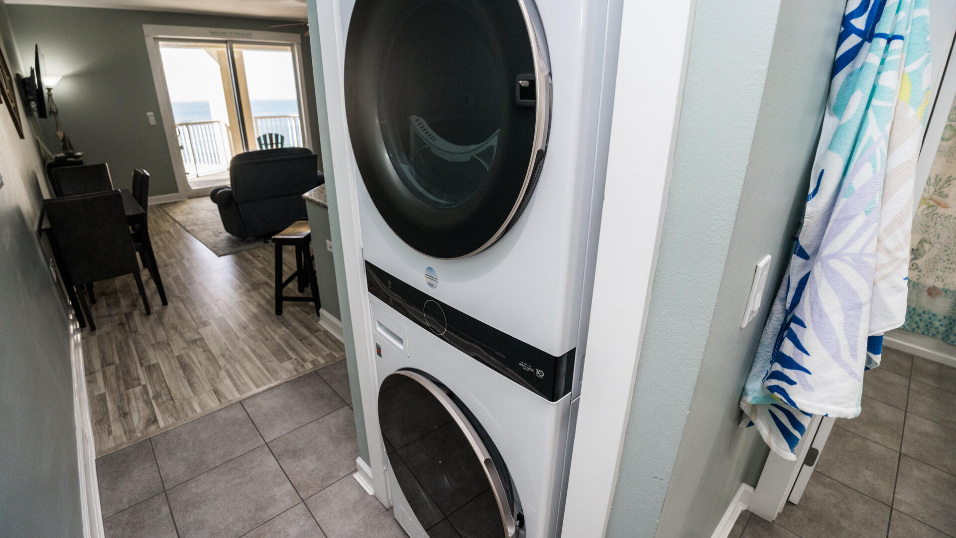 11800 Front Beach Road, Unit 703 Panama City Beach, FL 32407 - Photo 36 of 52 a view of a kitchen with washer and dryer