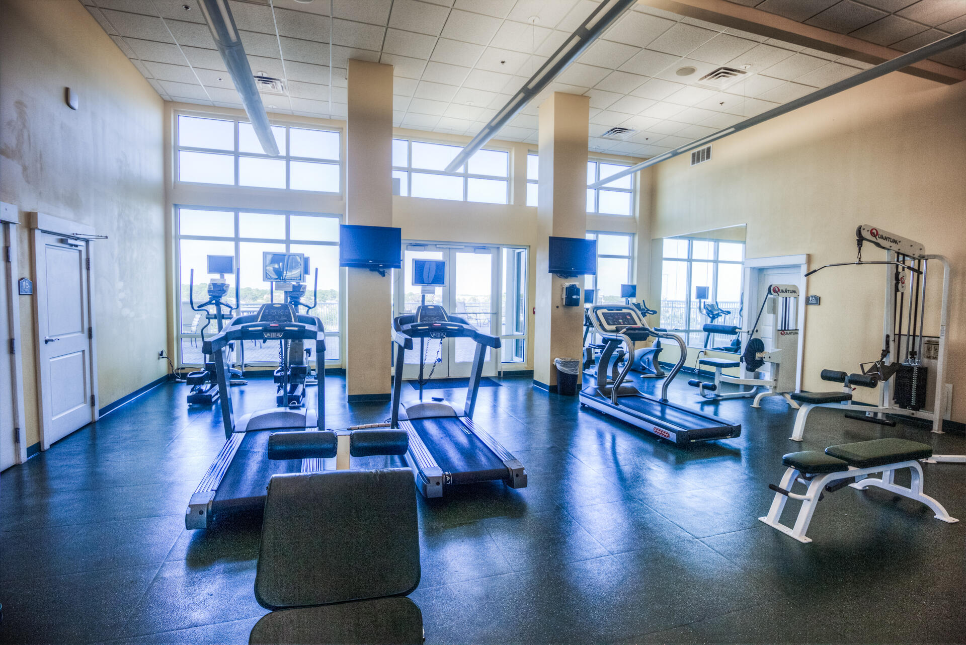11800 Front Beach Road, Unit 703 Panama City Beach, FL 32407 - Photo 51 of 52 a view of a dining room with lots of furniture and wooden floor