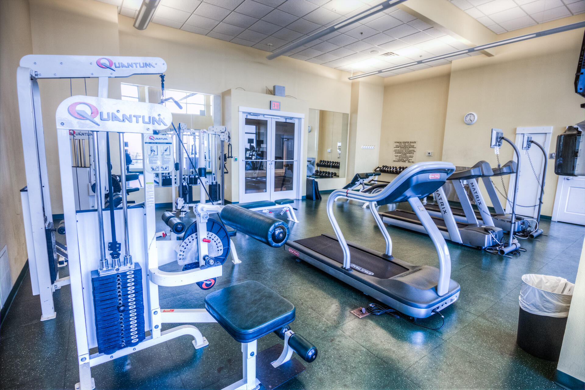 11800 Front Beach Road, Unit 703 Panama City Beach, FL 32407 - Photo 52 of 52 a living room with lots of gym equipment