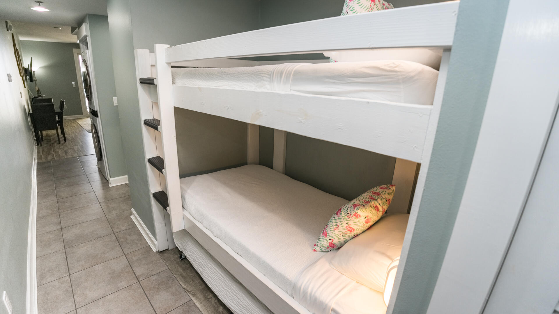 11800 Front Beach Road, Unit 703 Panama City Beach, FL 32407 - Photo 8 of 52 a bedroom with a bed and a mirror