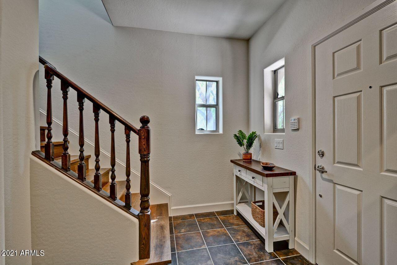 3935 East Rough Rider Road, Unit 1360 Phoenix, AZ 85050 - Photo 4 of 43 AVIANO 1360 Entry Foyer Staircase