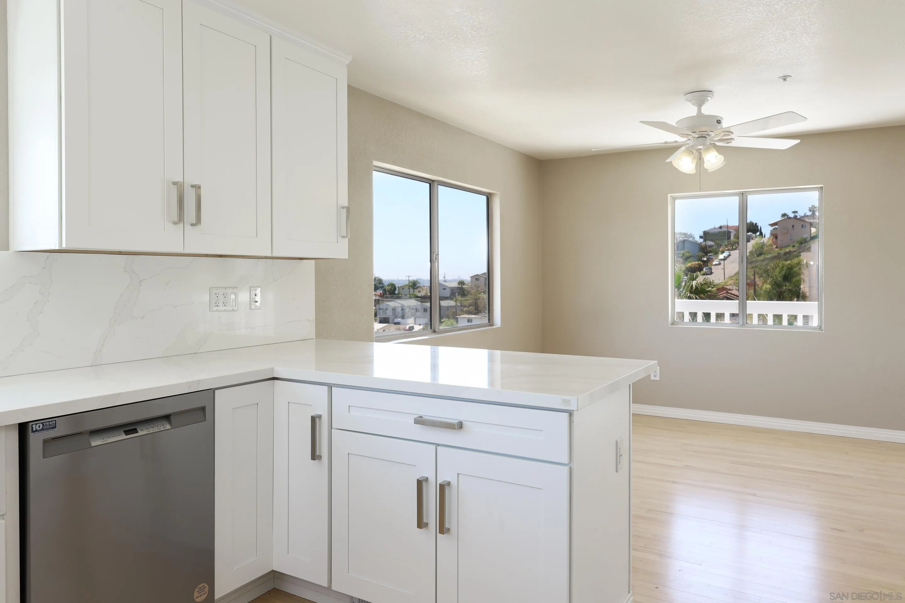 1412 San Miguel Avenue Spring Valley, CA 91977 - Photo 16 of 44 a kitchen with a sink cabinets and window