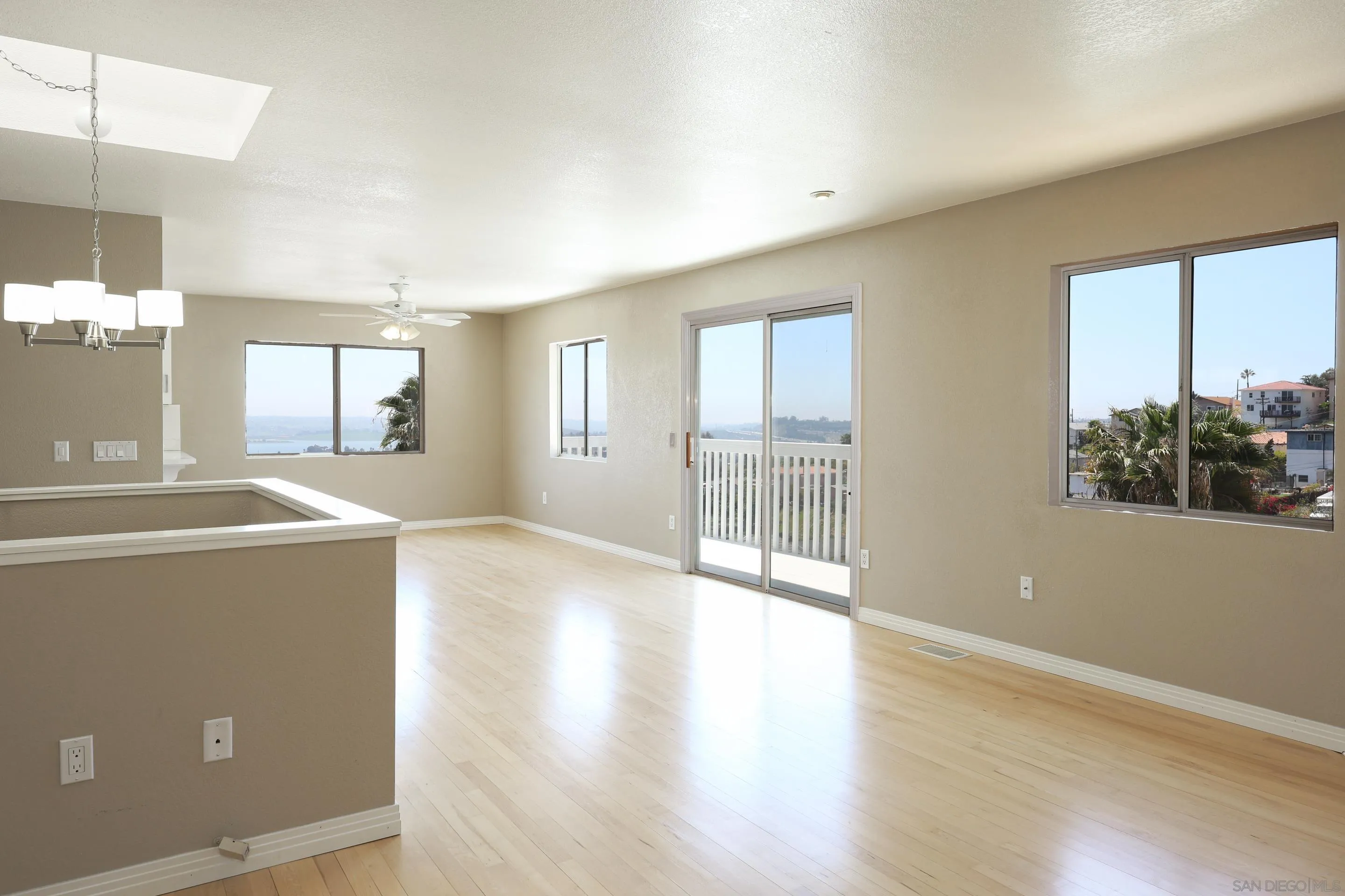 1412 San Miguel Avenue Spring Valley, CA 91977 - Photo 20 of 44 a view of a big room with wooden floor and windows