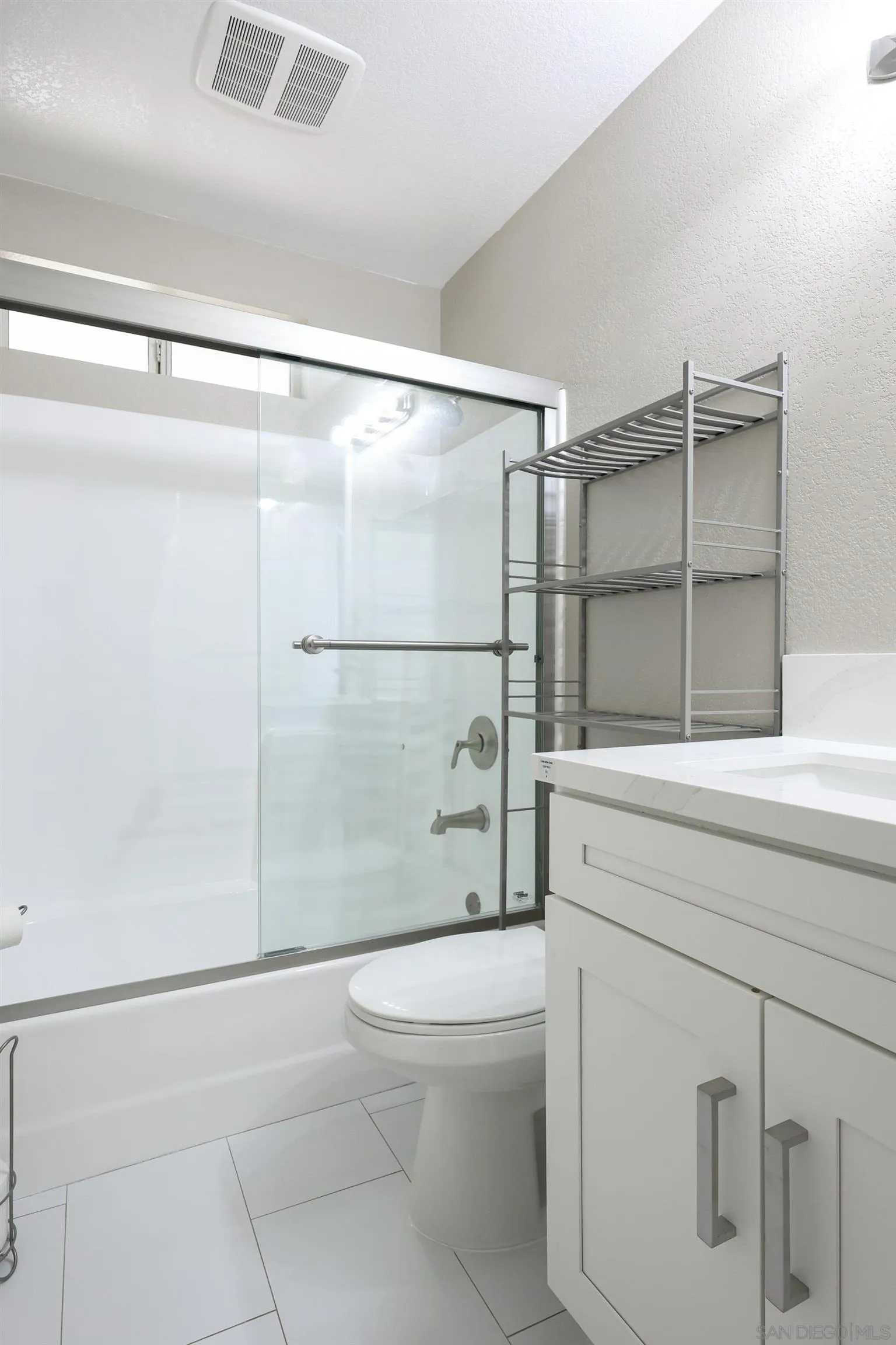 1412 San Miguel Avenue Spring Valley, CA 91977 - Photo 28 of 44 a bathroom with a toilet and a shower