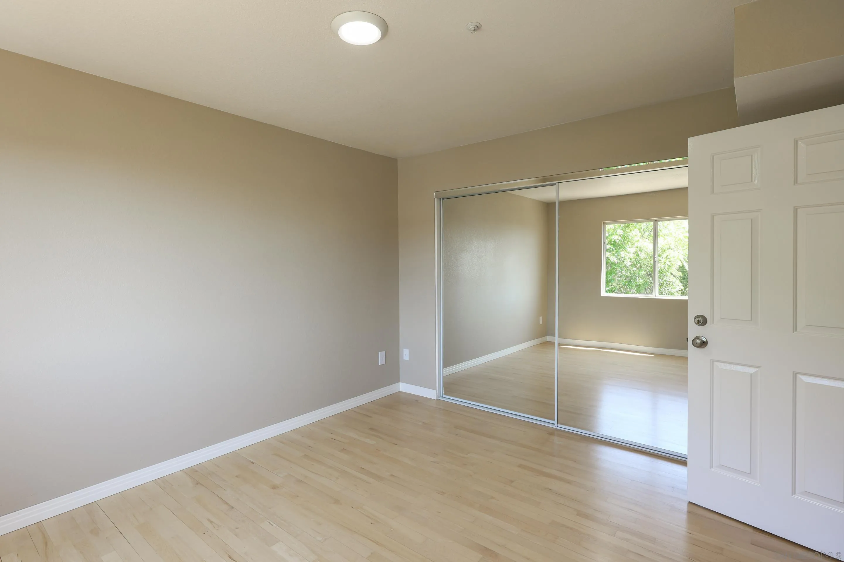 1412 San Miguel Avenue Spring Valley, CA 91977 - Photo 34 of 44 a view of empty room with wooden floor and fan
