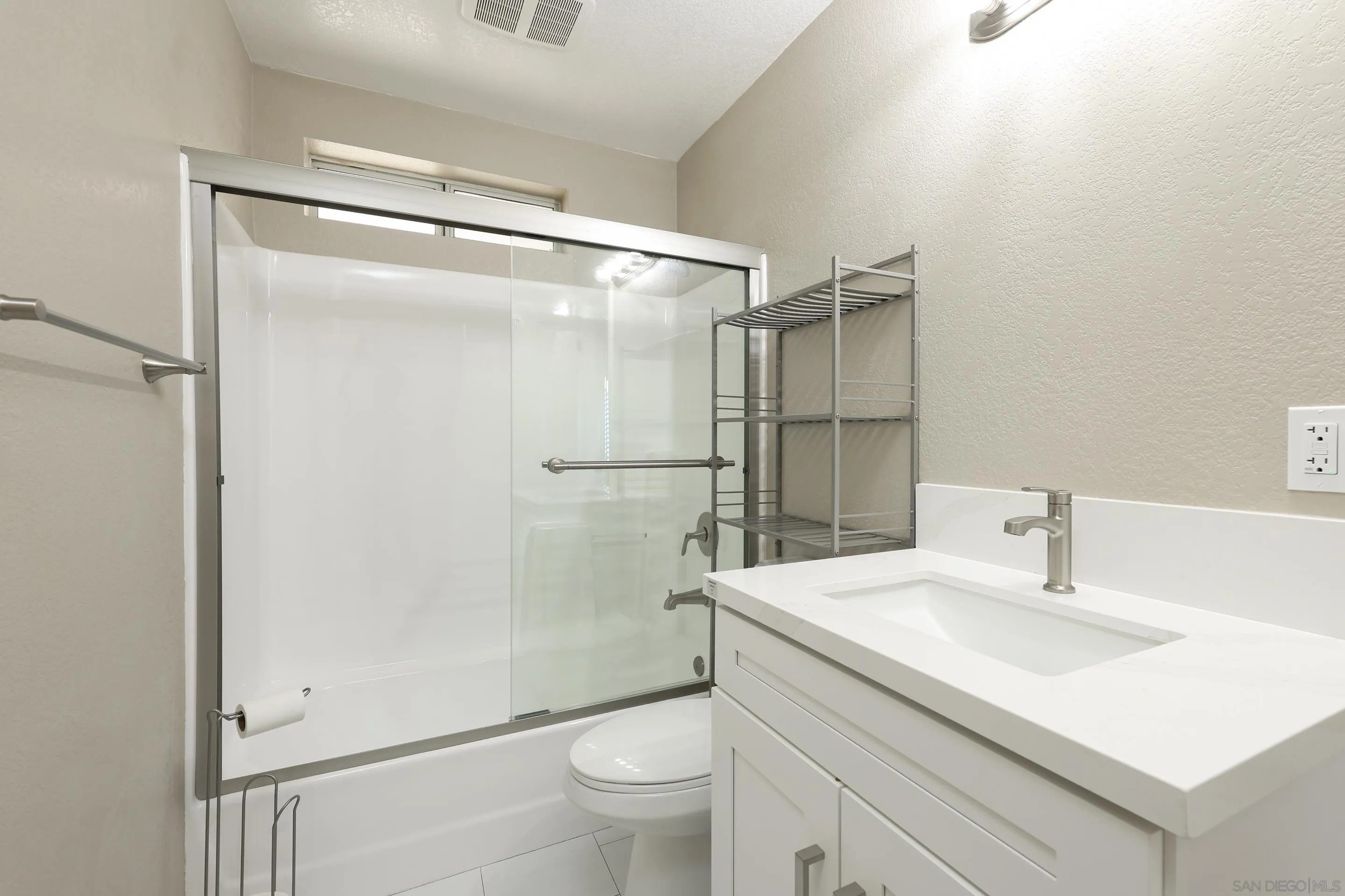 1412 San Miguel Avenue Spring Valley, CA 91977 - Photo 36 of 44 a bathroom with a sink toilet and shower