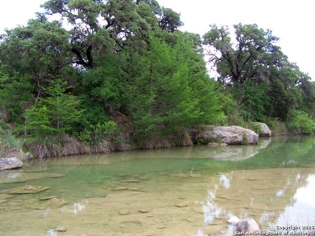 62 Turkey Trot Uvalde, TX 78801 - Photo 37 of 39 a view of a lake from a yard