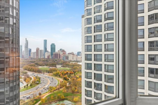 a view of a city with tall buildings