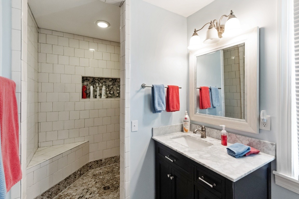 5895 Murfreesboro Road Lebanon, TN 37090 - Photo 12 of 31 a bathroom with a sink vanity and a mirror