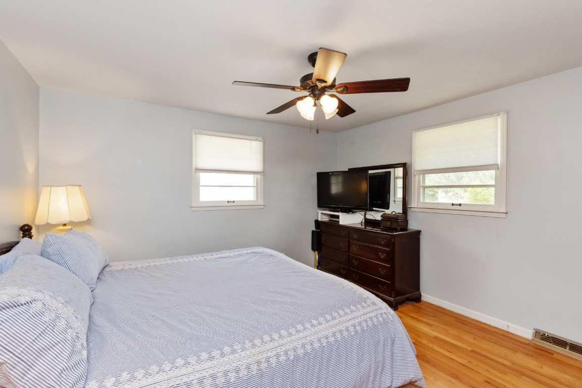 5895 Murfreesboro Road Lebanon, TN 37090 - Photo 14 of 31 a bedroom with a bed and a flat screen tv