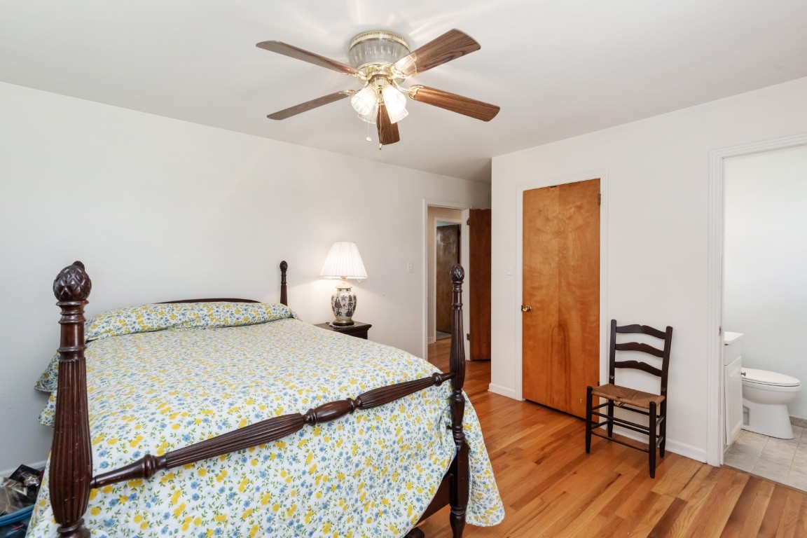 5895 Murfreesboro Road Lebanon, TN 37090 - Photo 18 of 31 a bedroom with a bed and a table