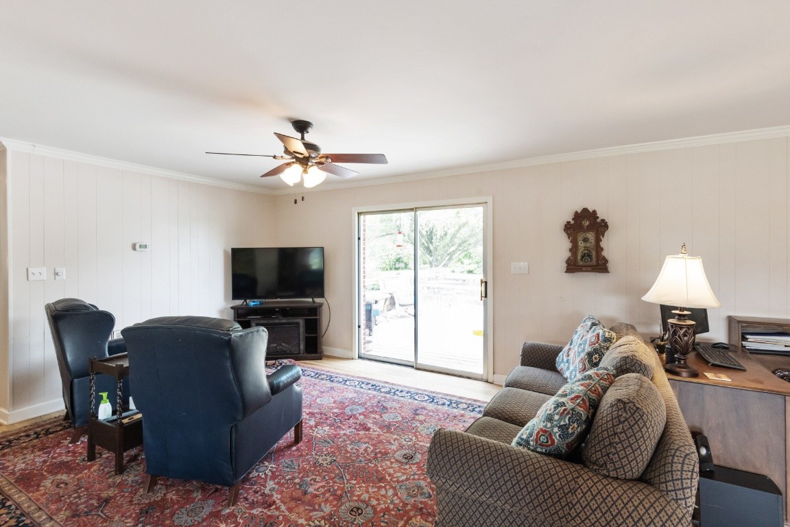 5895 Murfreesboro Road Lebanon, TN 37090 - Photo 30 of 31 a living room with furniture and a flat screen tv